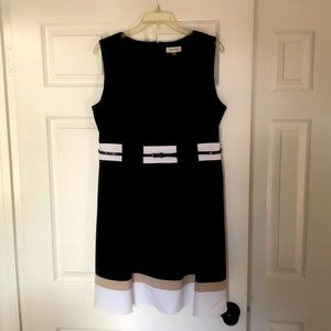 Black Calvin Klein dress with belt. 16P